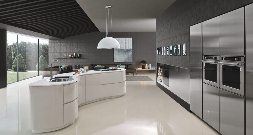White curved cabinets with curved doors and Metal tall units | Luxury Kitchens IN Design Kitchens | design studios in Hawkhurst and Brighton | Sussex and Kent 