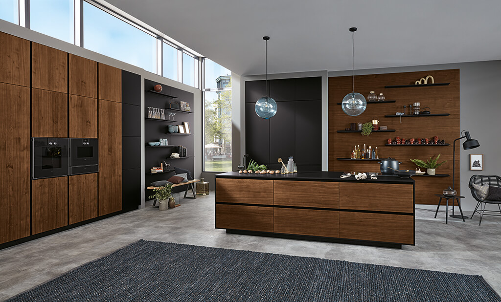 Laminate Wood effect Kitchen with Vertical Grip rails and mixed with some dark plain door units 