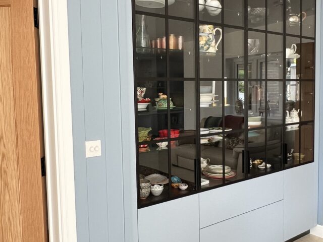 Smoked glass dresser units | Glass Dresser units in painted blue colour | Living spaces | Kitchen showroom Cranbrook