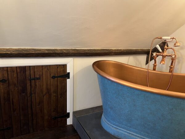 IN Design bathroom design, supply and installation. Copper bath